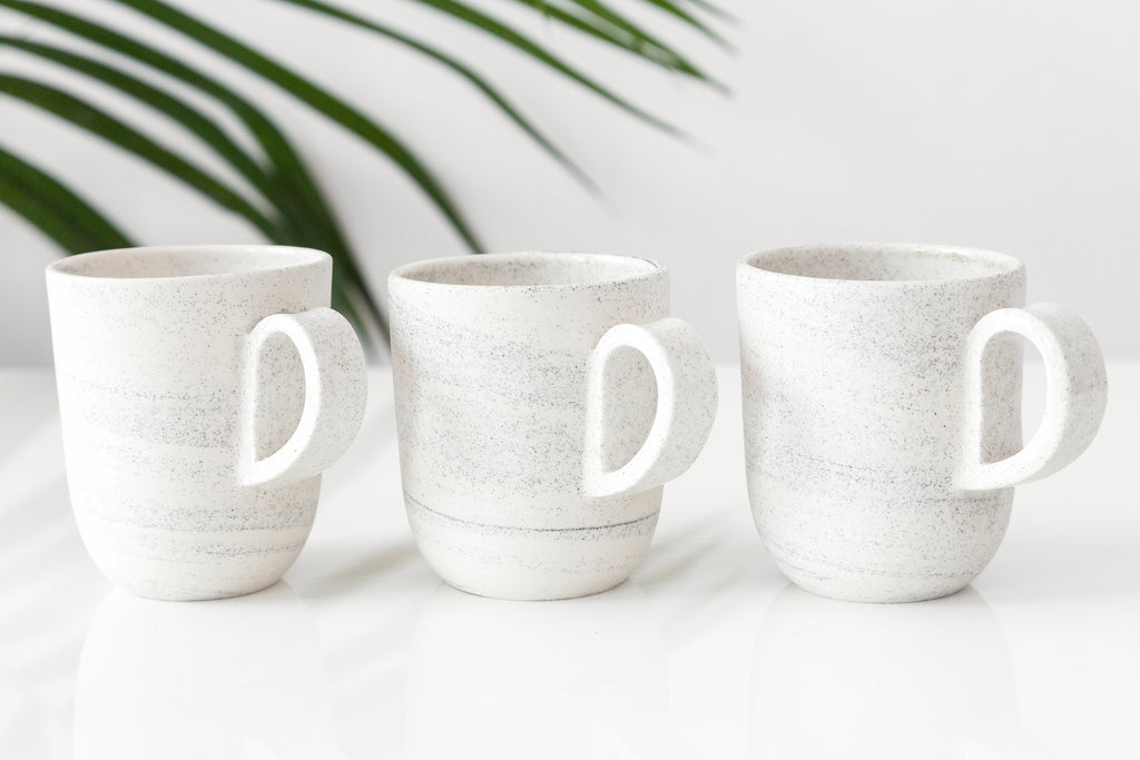 Small pottery mug with handle, speckled ceramic. Handmade in Montreal, Canada by Parceline.